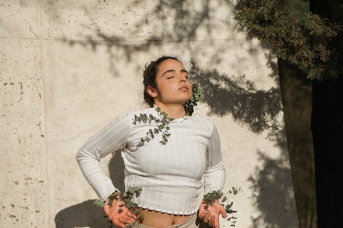 Pretty Woman with Leaves on Her Sweatshirt