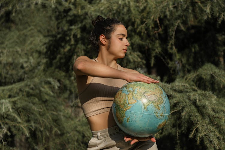 Environmentalist Holding A Globe