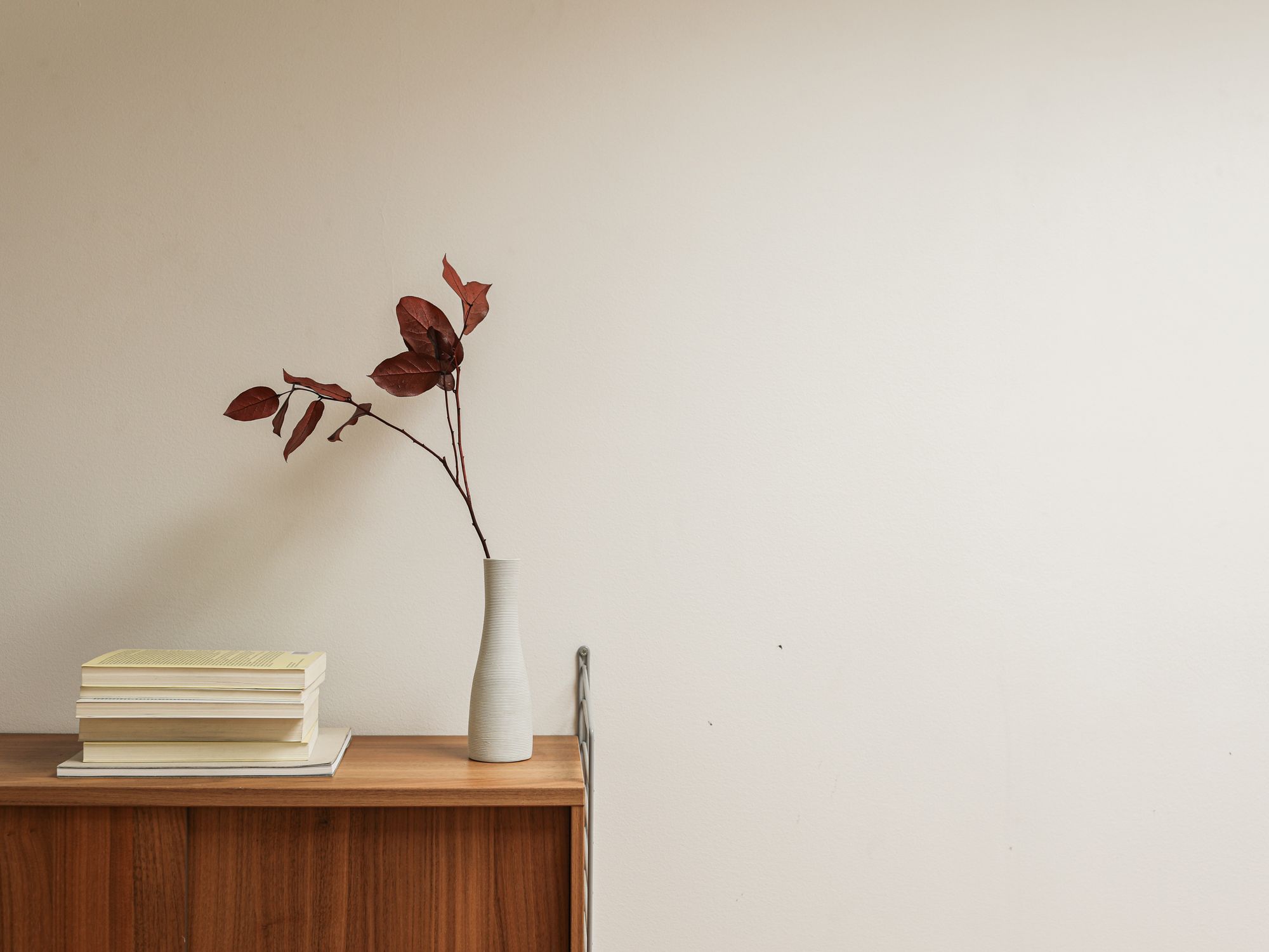 Wallpapering in Hackney Central, Hackney — decorator hanging pattern-matched wallpaper