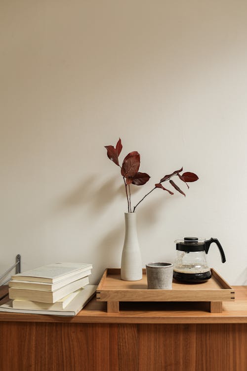 Free Coffee Pot and a White Vase on a Wooden Tray Stock Photo