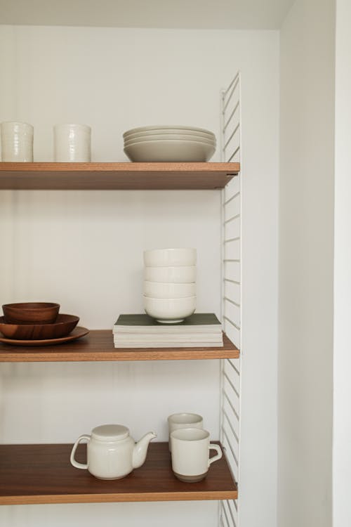 Free Kitchen Shelves with Flatware Stock Photo