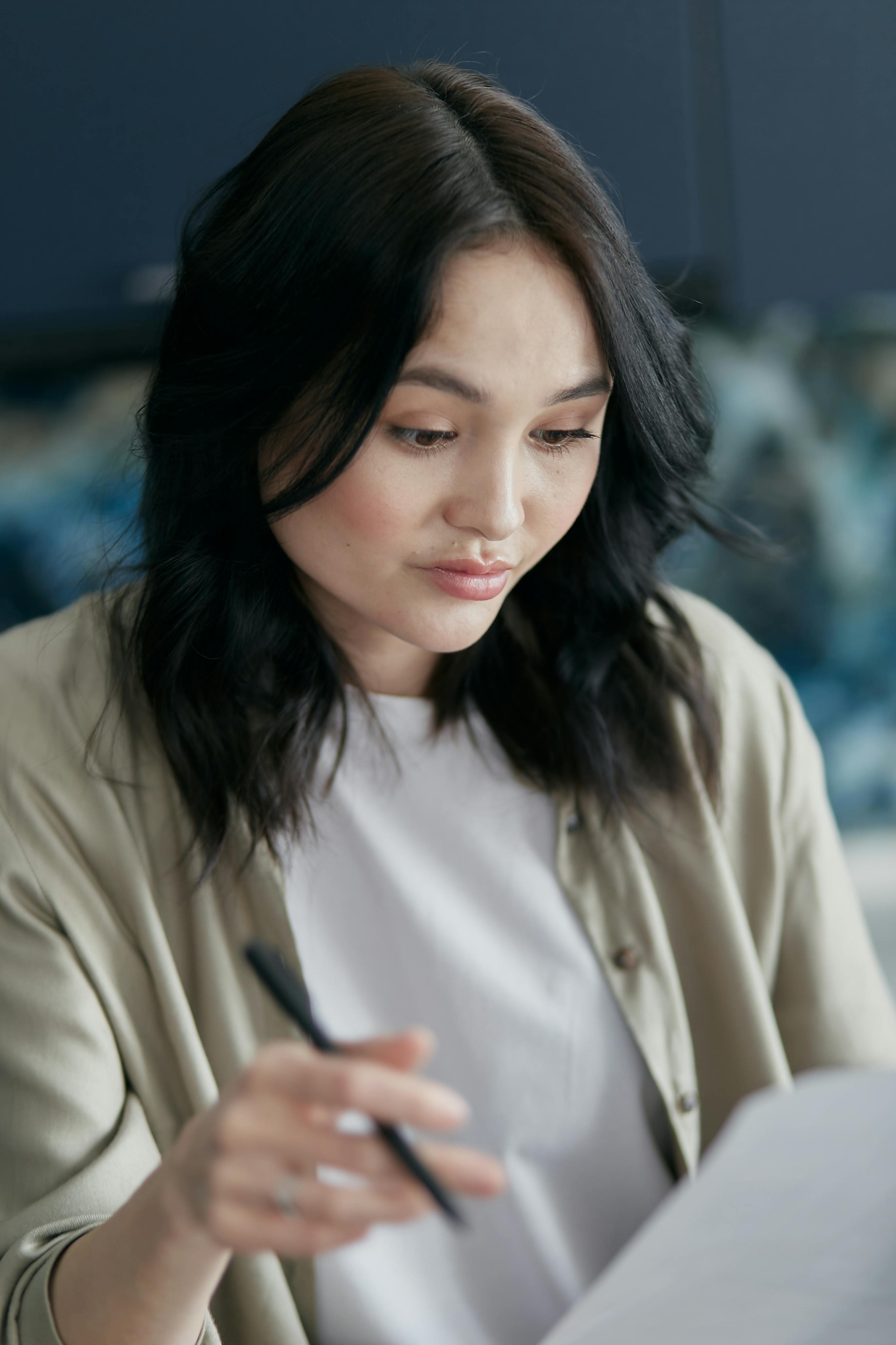 a woman reviewing a document