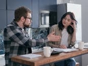 Disappointed Man Talking to his Partner