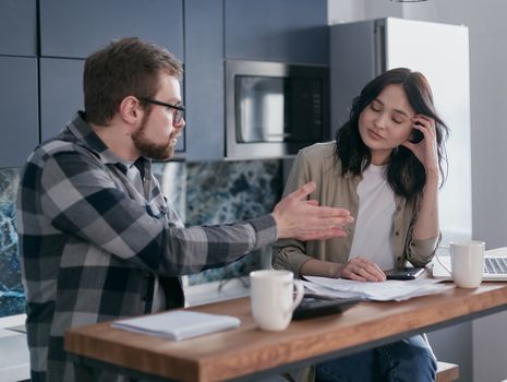Disappointed Man Talking to his Partner