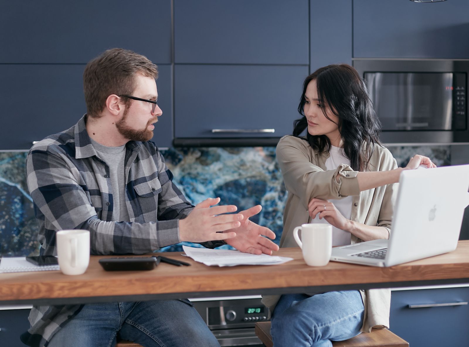 Two people in conversation outdoors after making progress in therapy