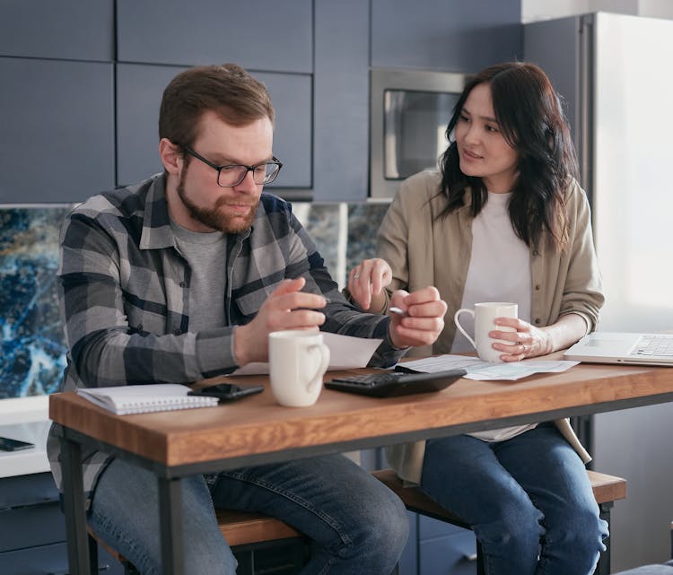 A Man And A Woman Having An Argument About Work