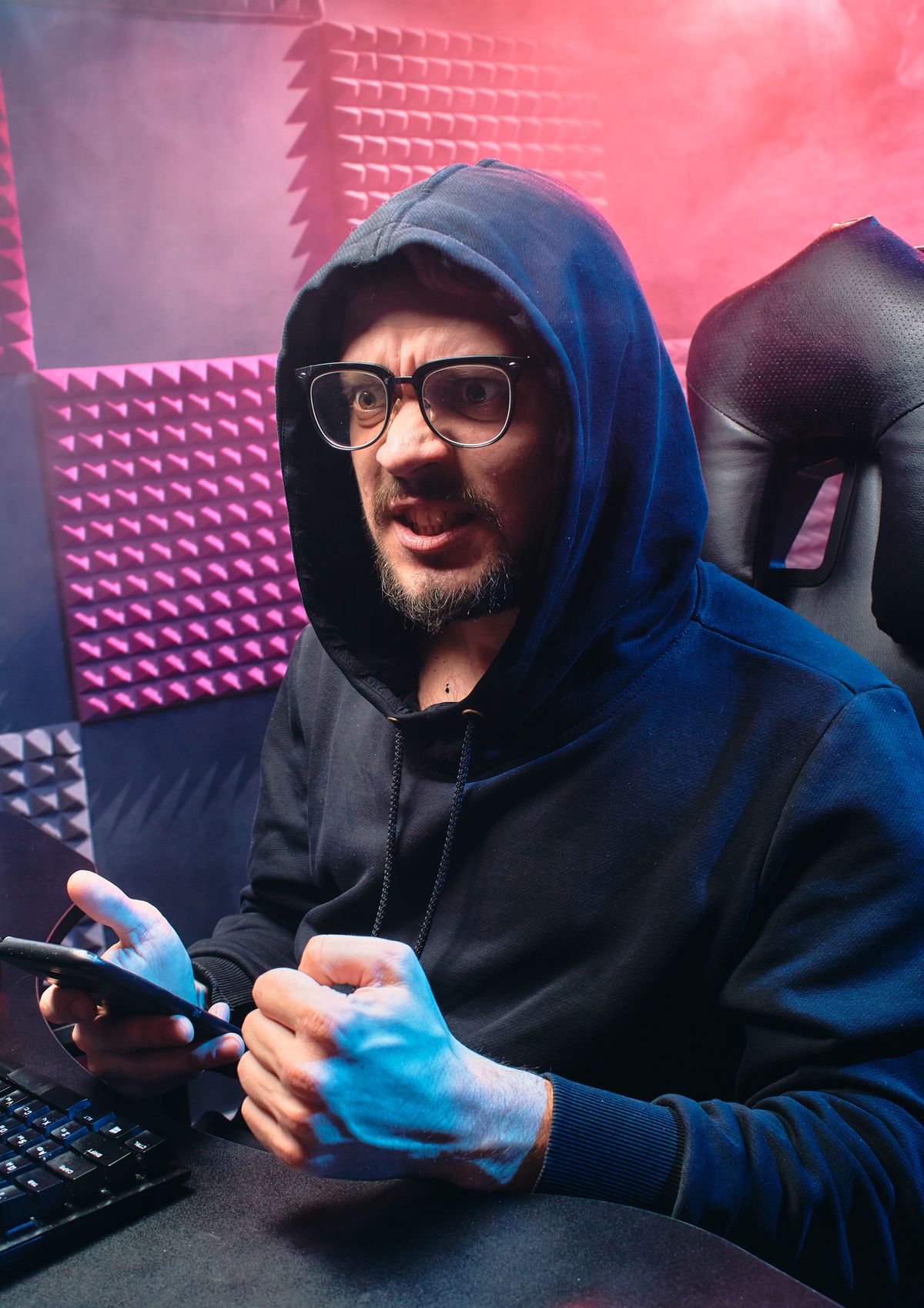 Cybersecurity professional reviewing digital information on a computer