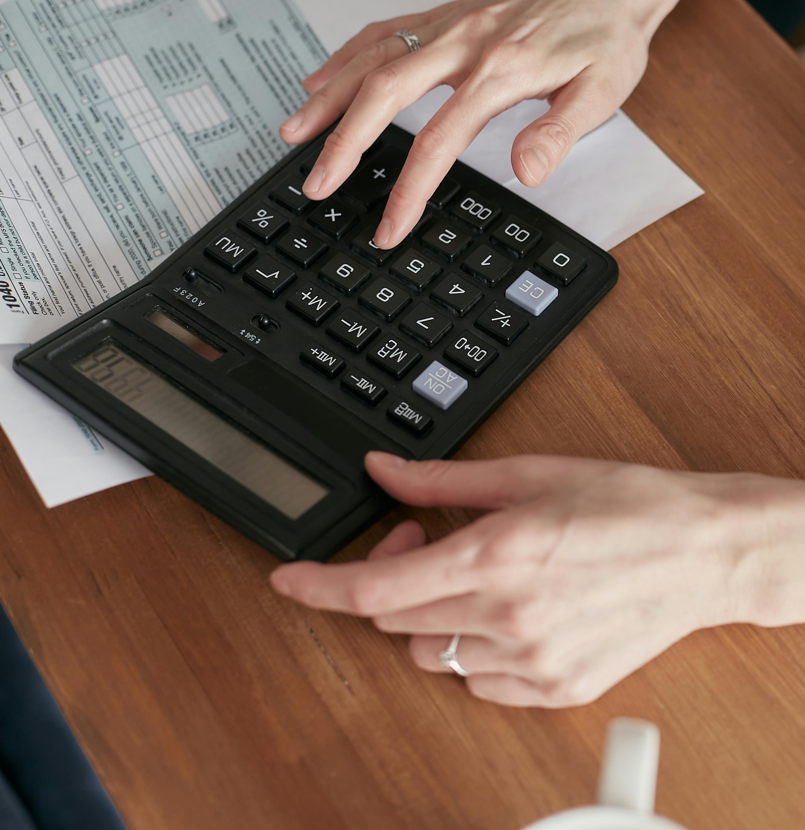 person holding black laptop computer