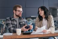 Man and Woman Sitting at Table