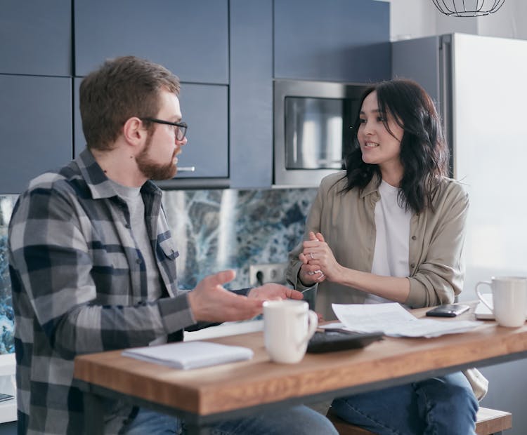 Man And Woman Talking To Each Other