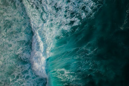 Bird's Eye View Photo of Waves Crashing in the Sea