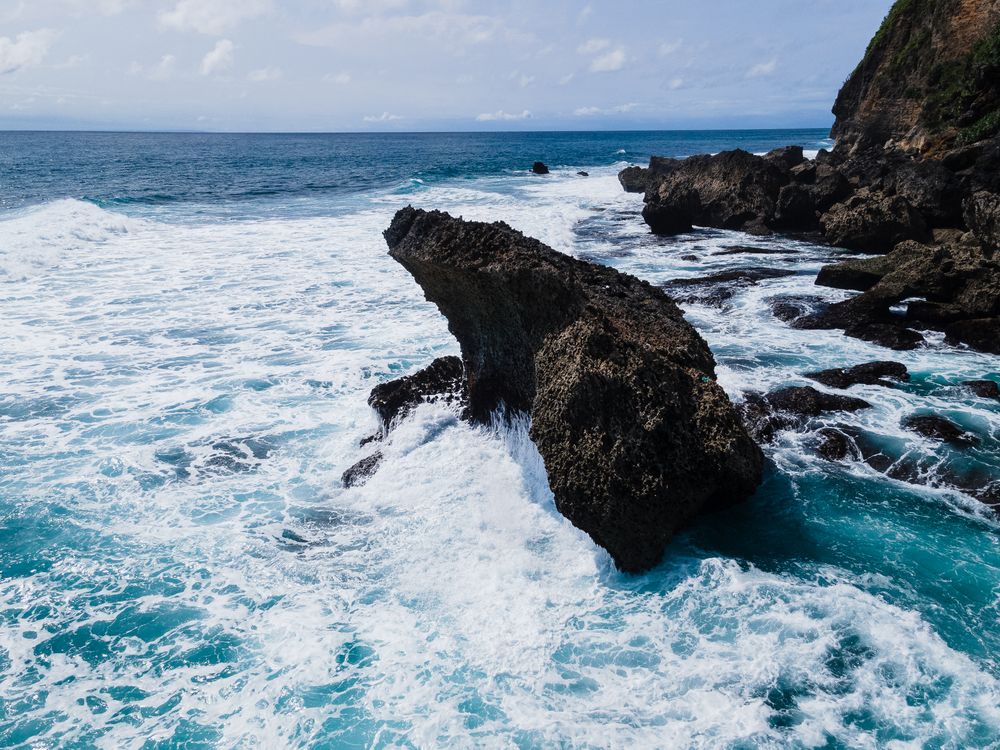 A Rock Formations on the Sea · Free Stock Photo