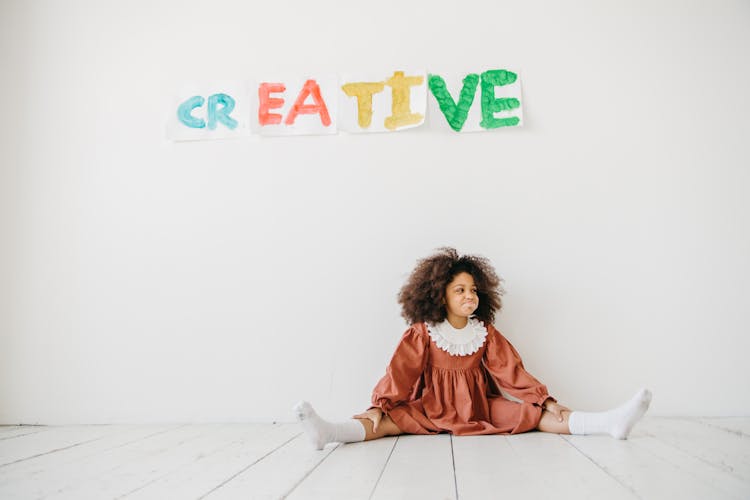 Girl Sitting On The Floor