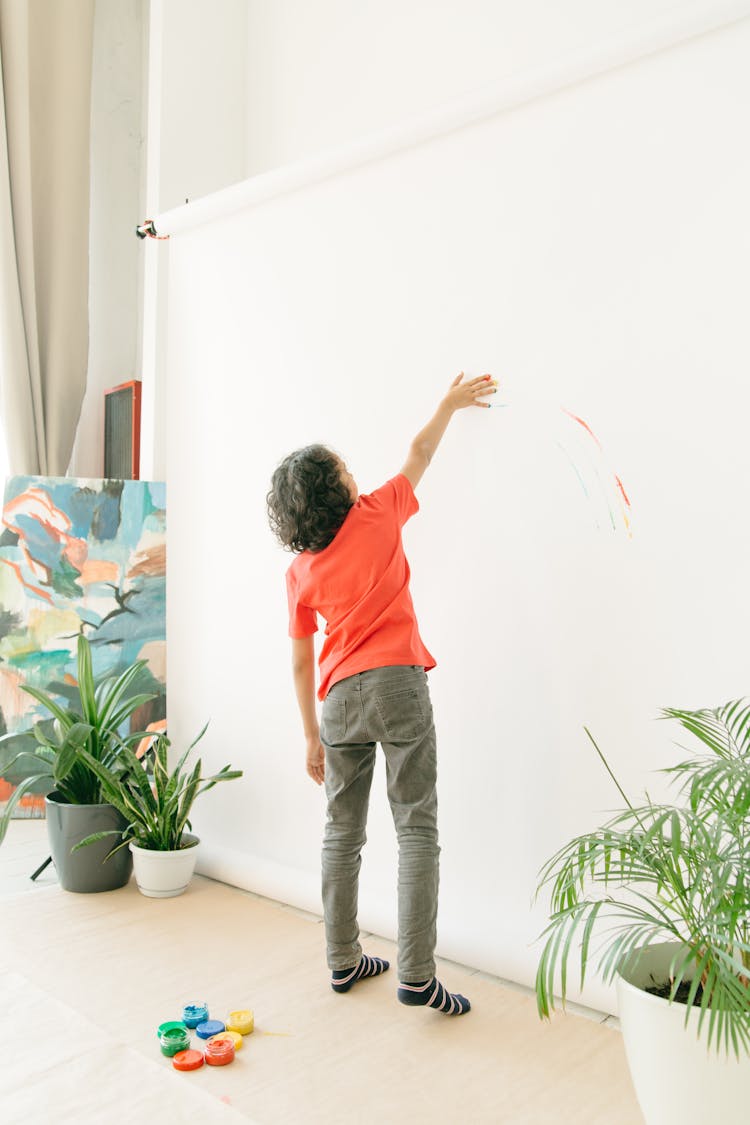 Boy Painting With His Hand