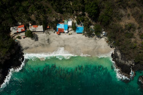 Drone Shot of Ocean Waves Crashing on the Shore