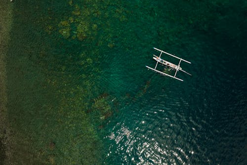 An Aerial Shot of a Fishing Boat in the Ocean