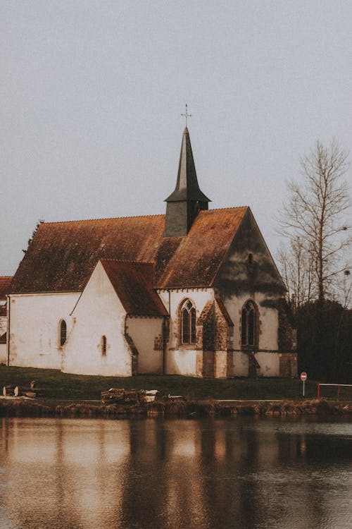 Old church near lake in countryside