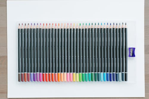 Free Coloring Pencils in a Plastic Container With Sharpener Stock Photo
