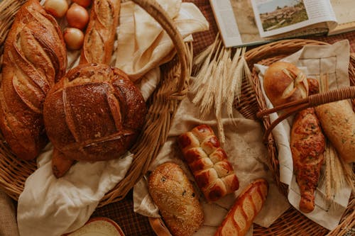 Free Close Up Photo of Bread on Basket Stock Photo