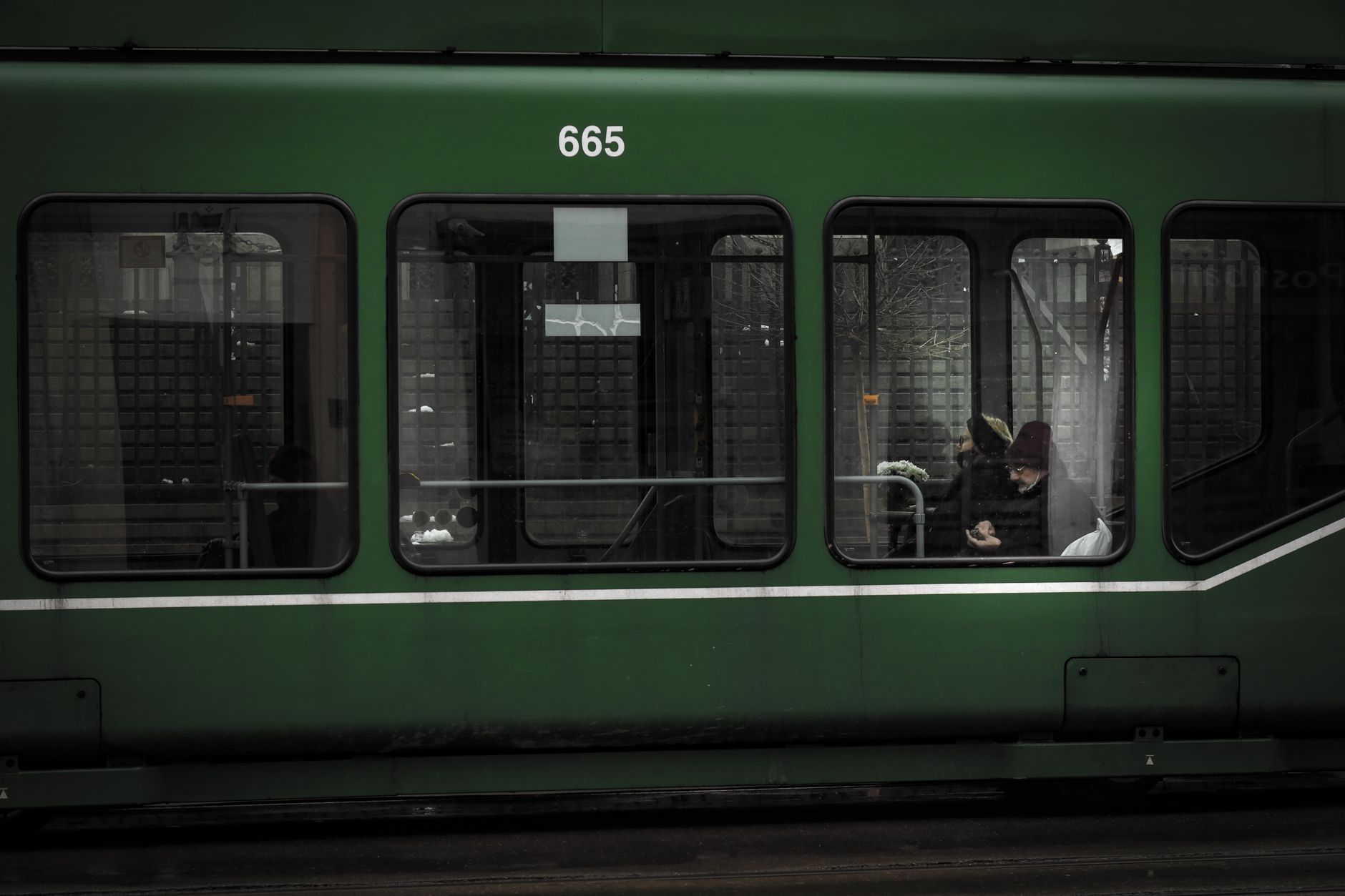 A step-free tram platform in central Sofia with a low-floor tram at the door