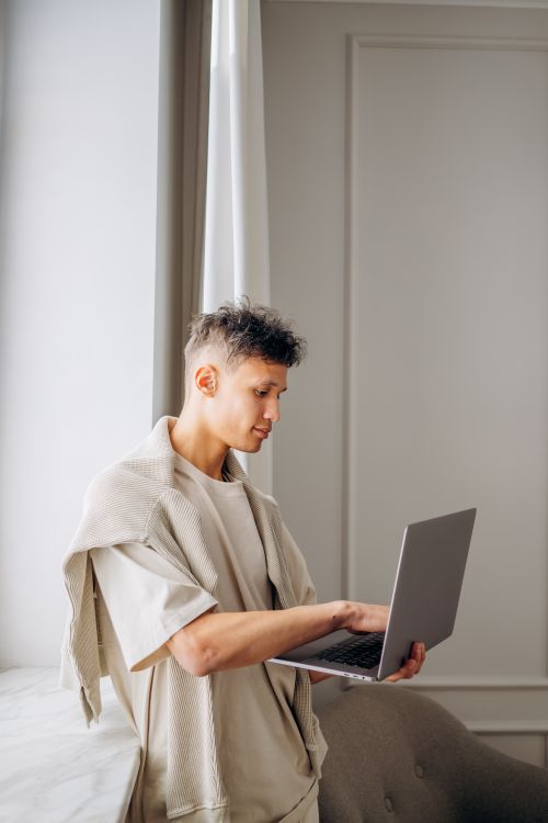 Person Using Macbook · Free Stock Photo