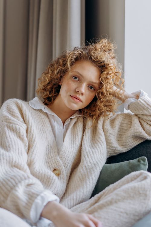 Woman in grandpa cardigan