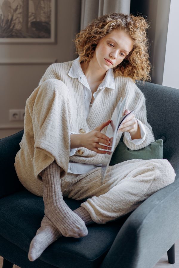 Woman in a soft ribbed knit jumpsuit