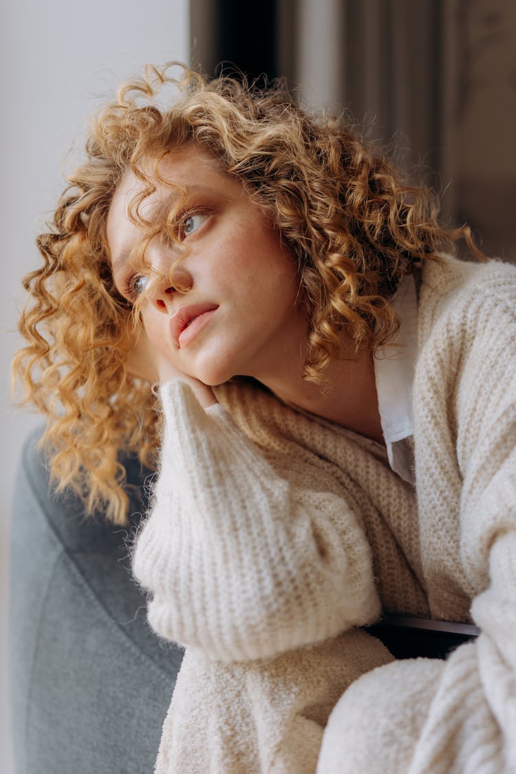 Woman In White Knit Sweater Looking Afar