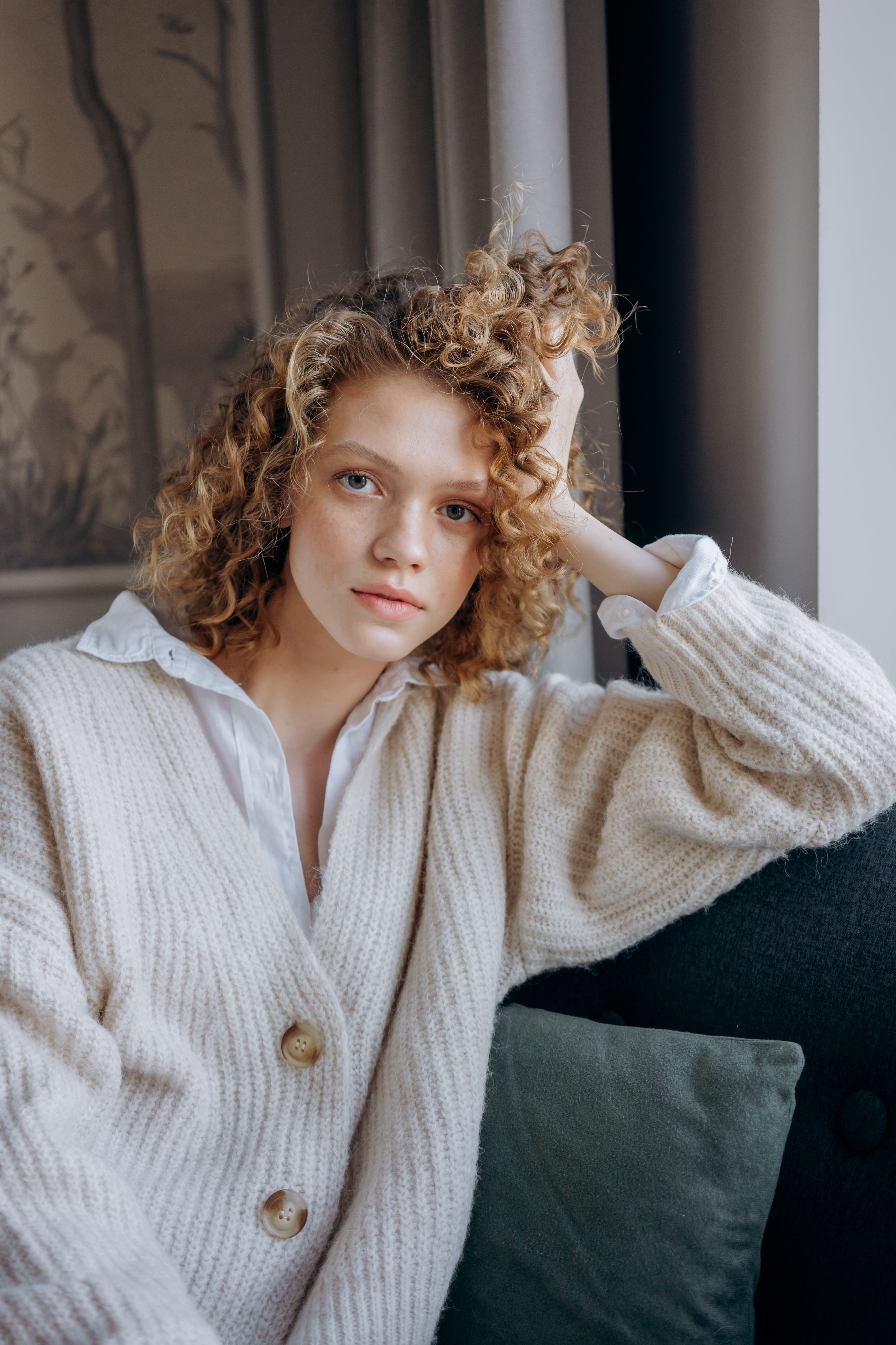 Woman in stylish cardigan outfit