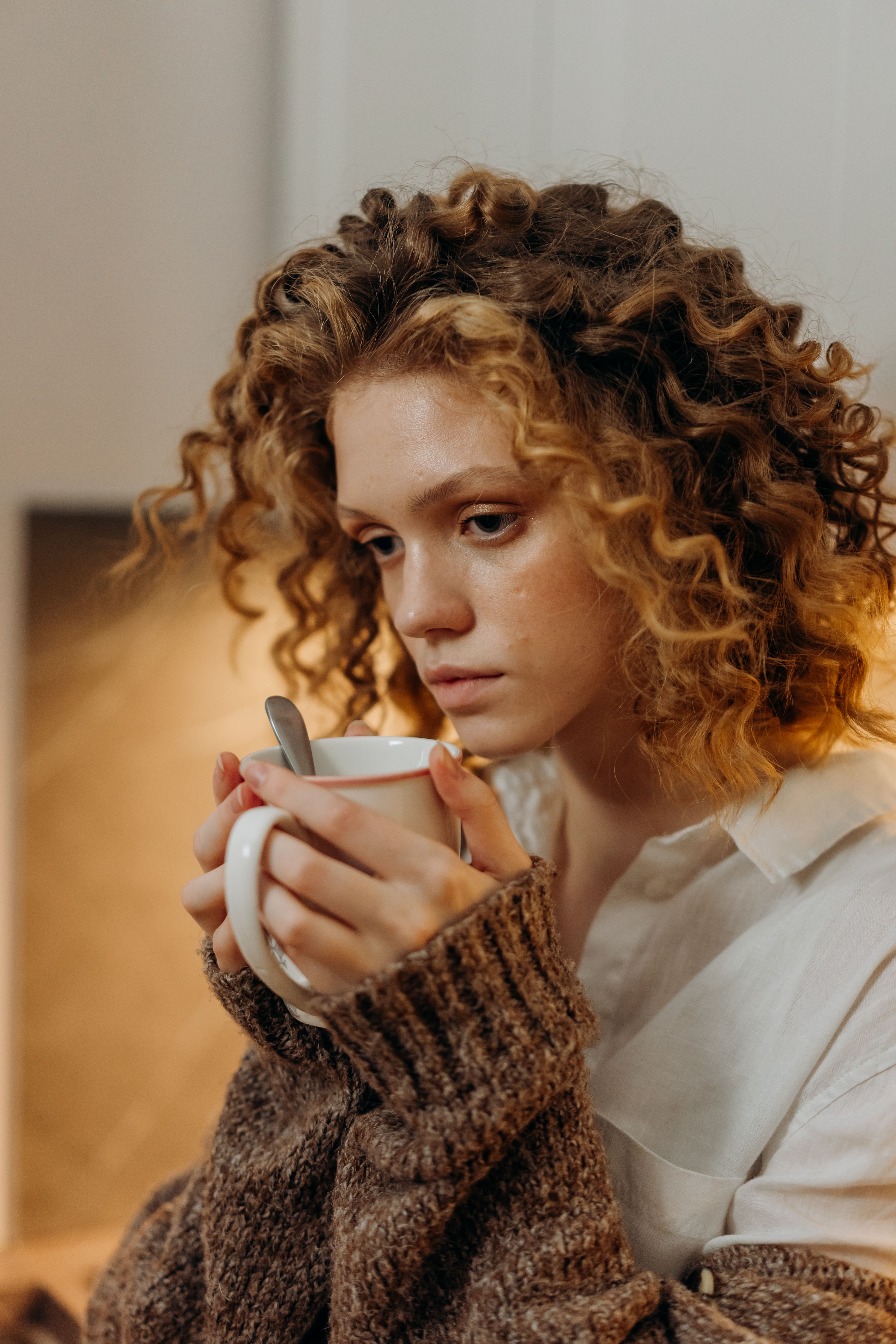 Woman in White Long Sleeve Shirt Holding White Ceramic Mug · Free Stock ...
