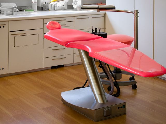 Bright treatment room with dental chair