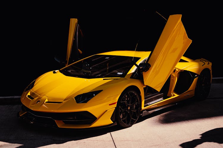 A Yellow Lamborghini Aventador On Display