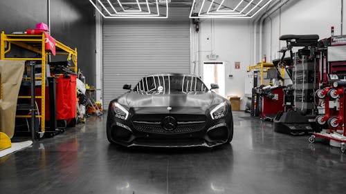 A Black Car in an Indoor Garage