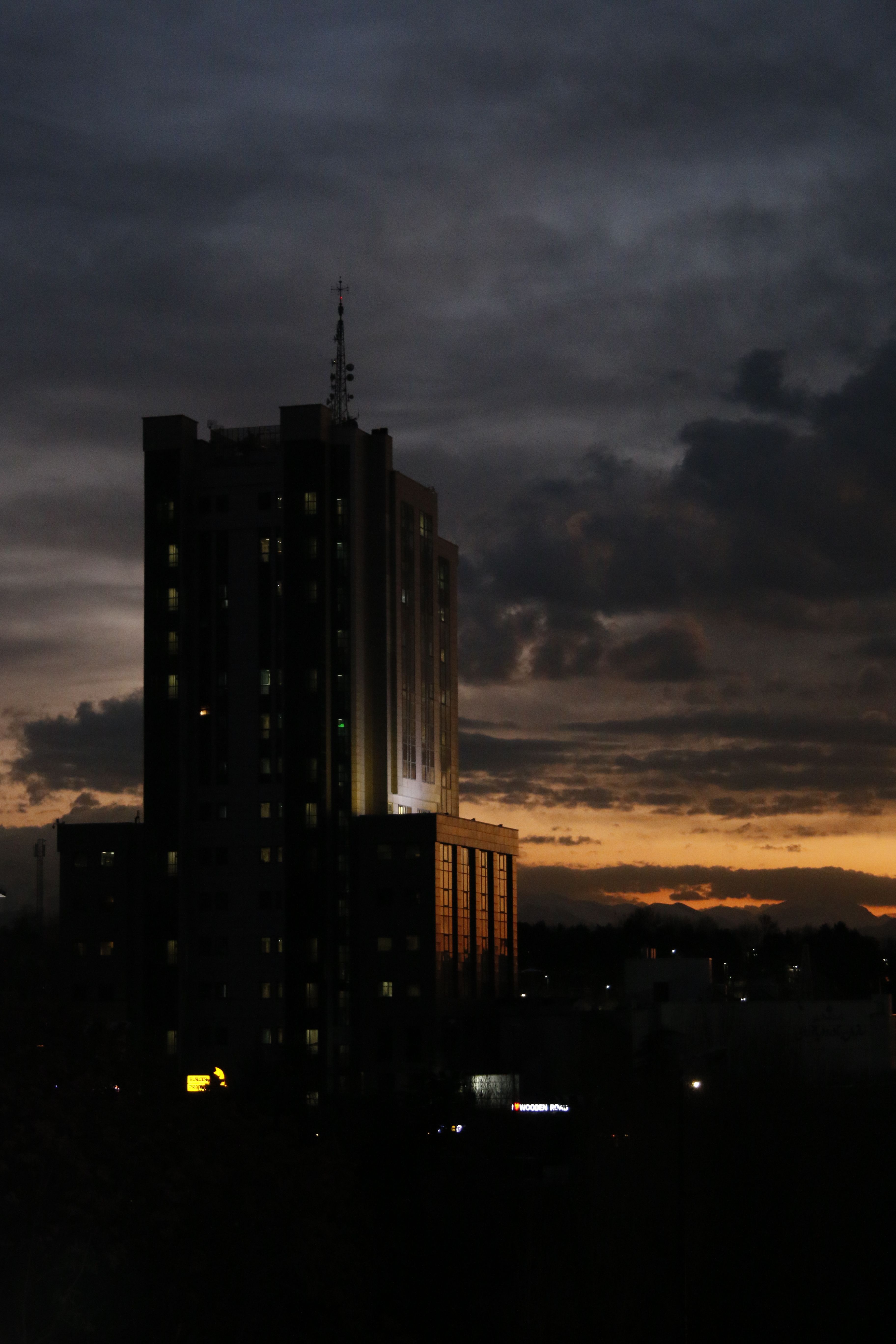 Silhouette of Building during Sunset · Free Stock Photo