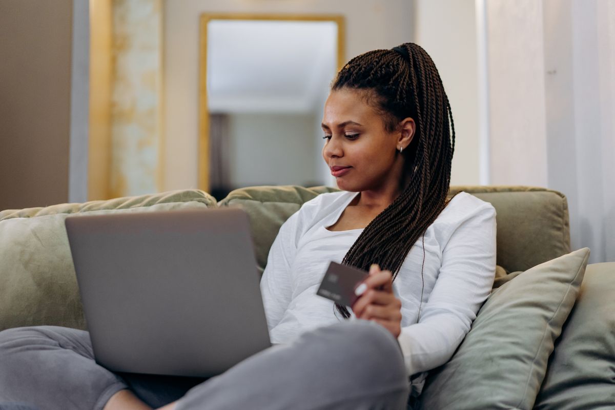 Customer paying securely by card on a laptop