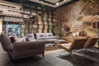 Contemporary spacious living room with gray cozy couches