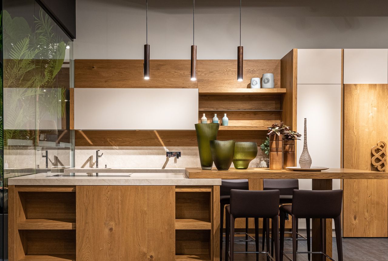 Contemporary interior design of spacious trendy kitchen with empty furniture