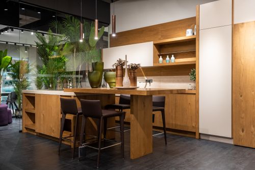 Free Modern fancy kitchen interior design with trendy furniture and decorative glass wall and vases Stock Photo