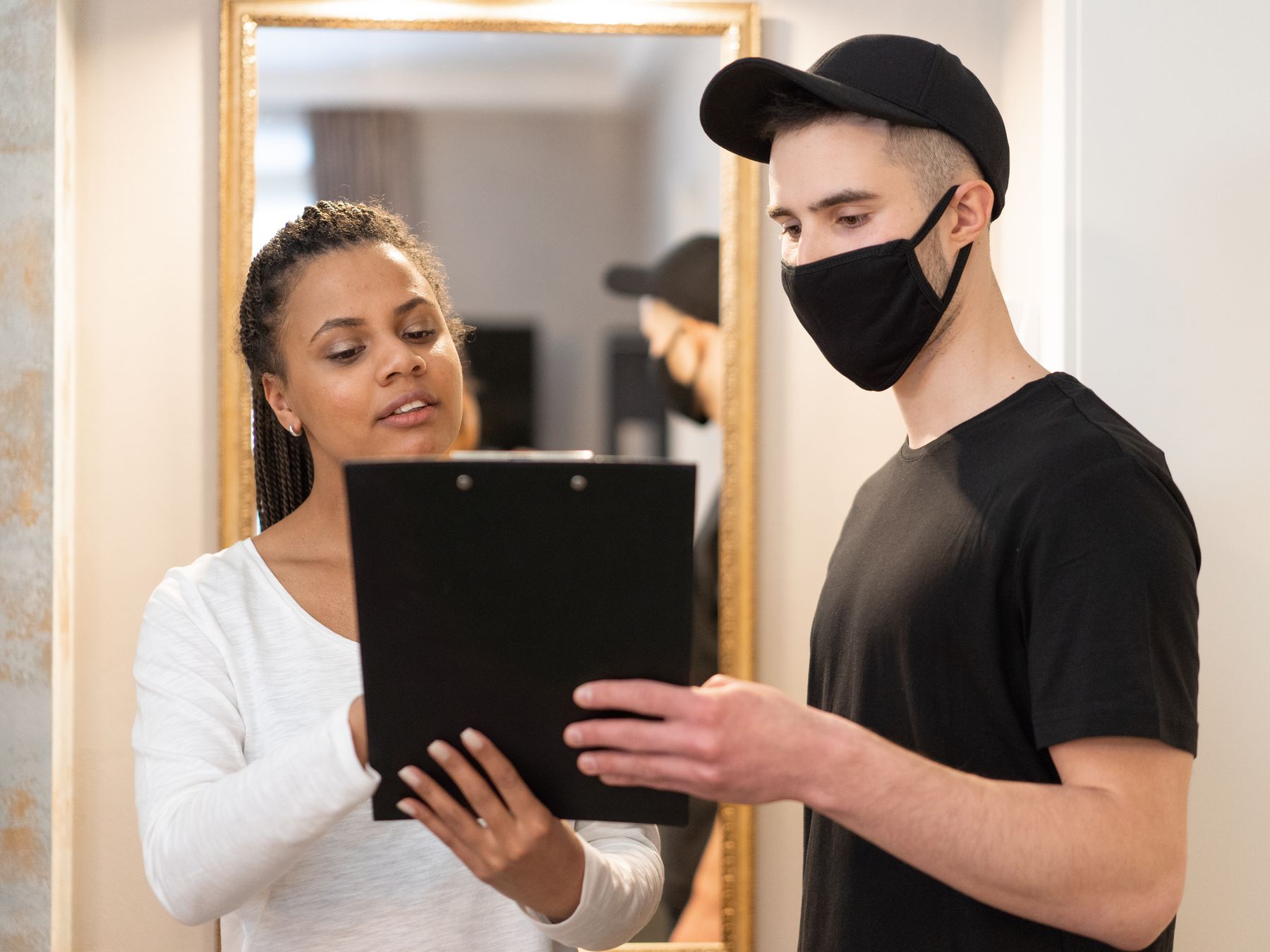 Stepps — professional movers carrying furniture on a house move