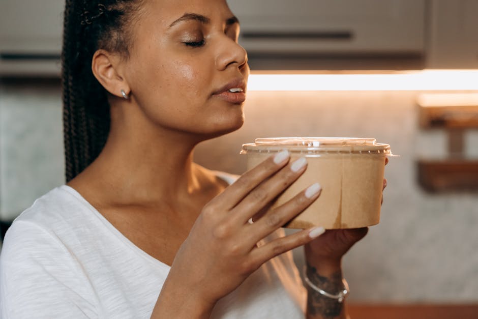 person noticing a strange smell in the kitchen while cooking - gas leak warning signs every homeowner should know person noticing a strange smell in the kitchen while cooking - gas leak warning signs every homeowner should know