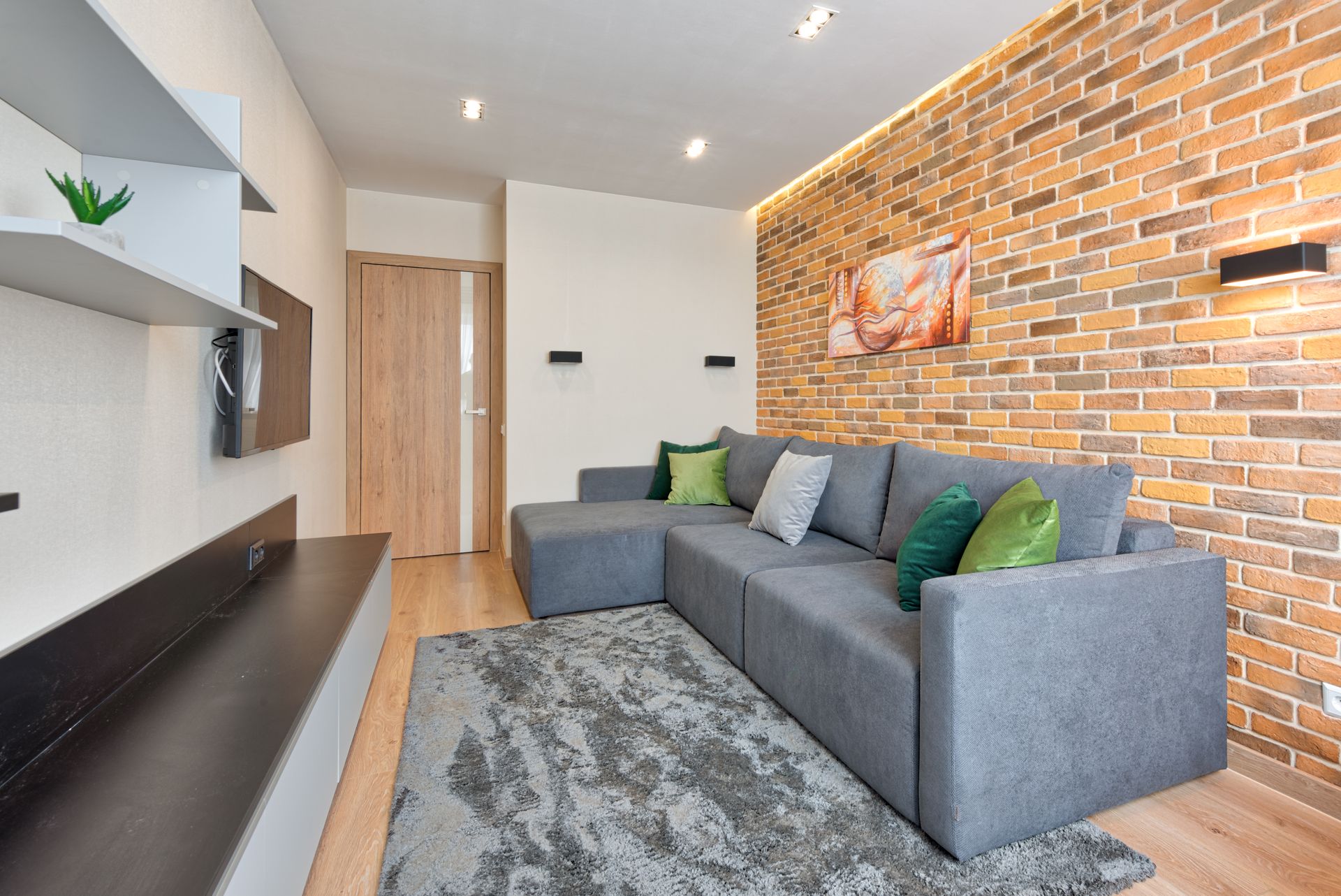 Living room with a grey L-shaped sofa