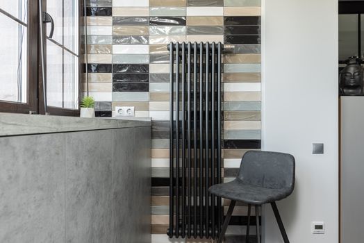 Installation radiateurs design dans un salon à Armentières