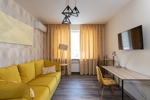 Cozy Living Room with Yellow Couch 