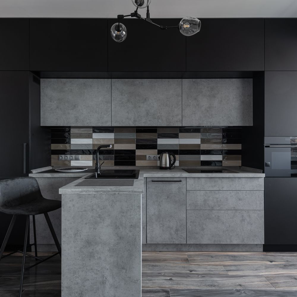 Kitchen Spraying in Goodmayes — clean edges cut in around trim and sockets