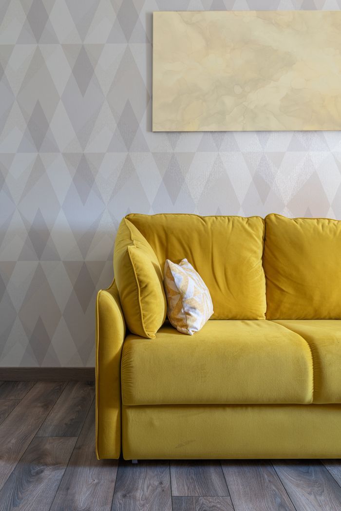 Sofa on parquet flooring