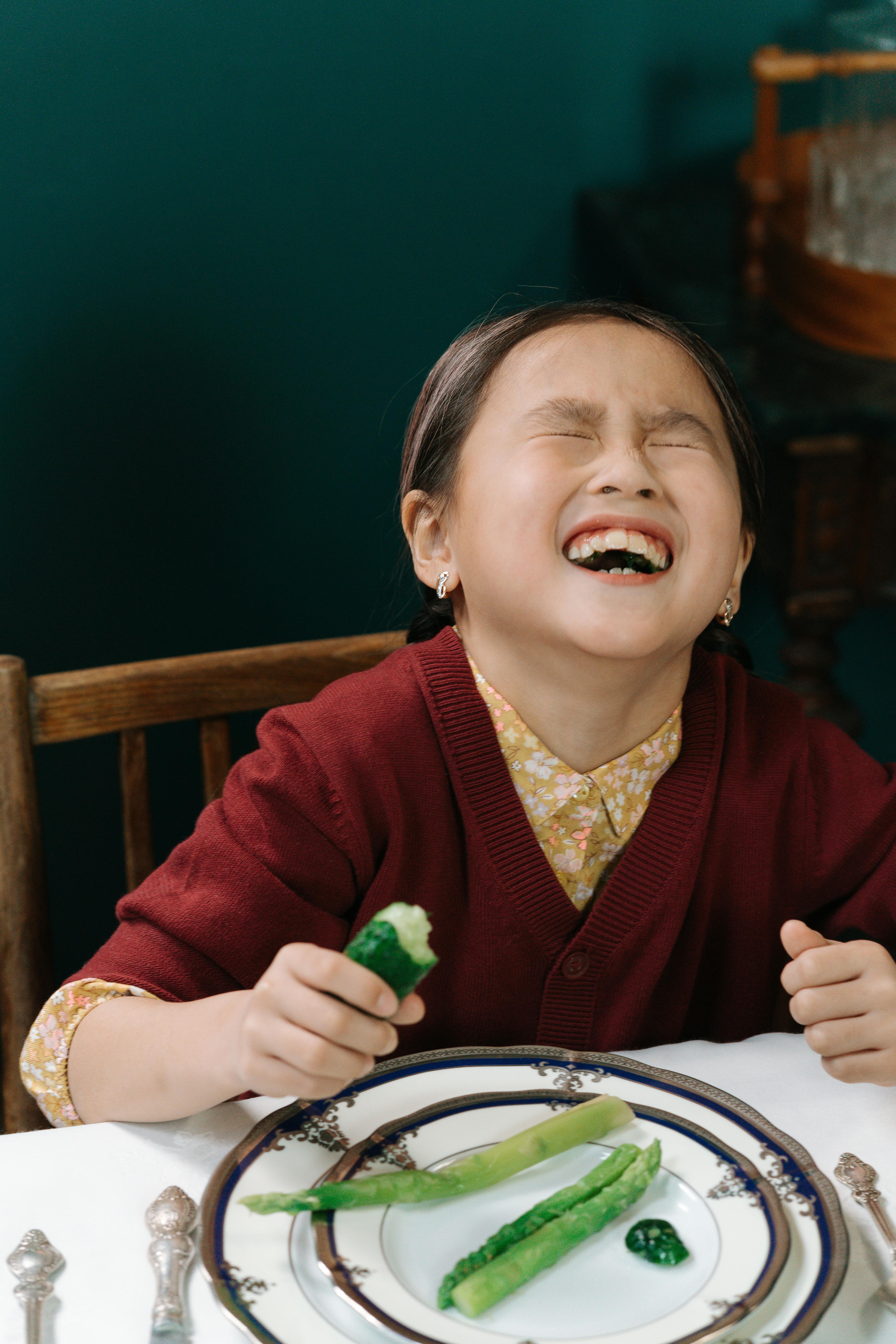 Girl in Red Clothing Laughing · Free Stock Photo