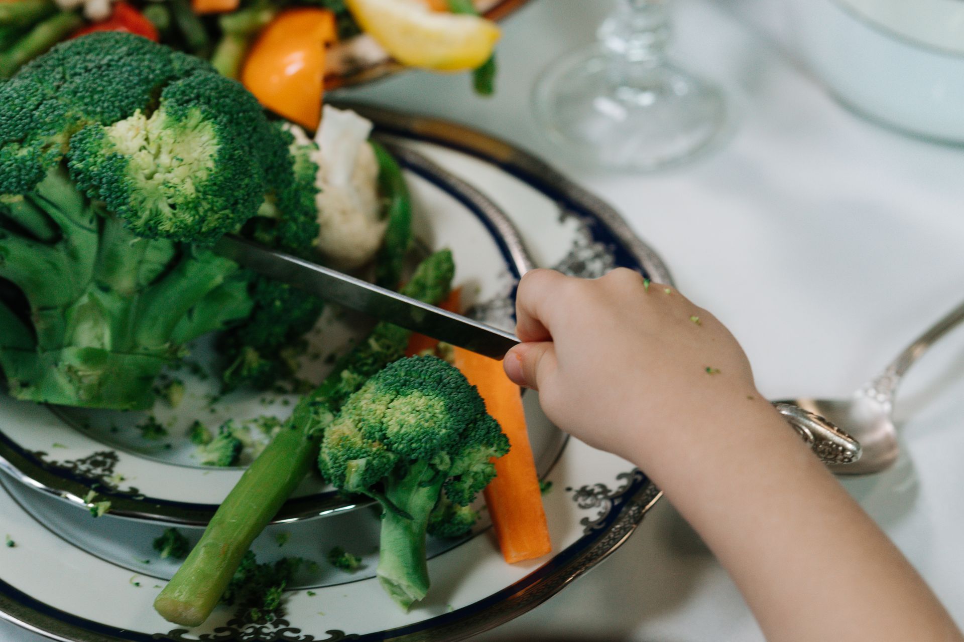 A child eating at a family kitchen table