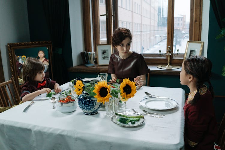 A Family Eating Together At Home