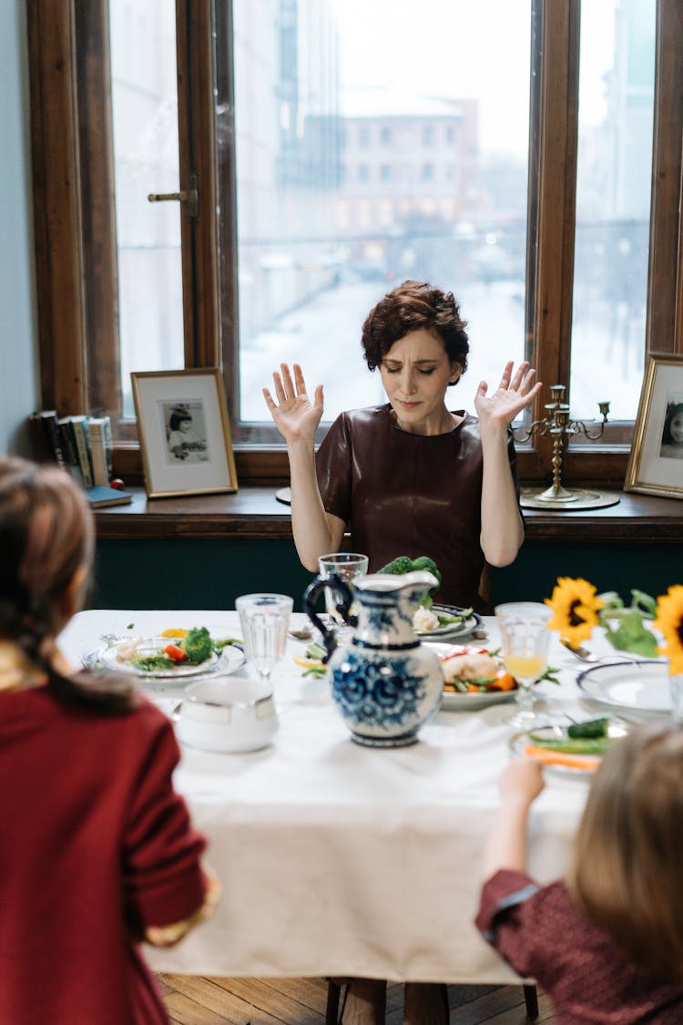 Stressed Mother Putting Her Hands Up