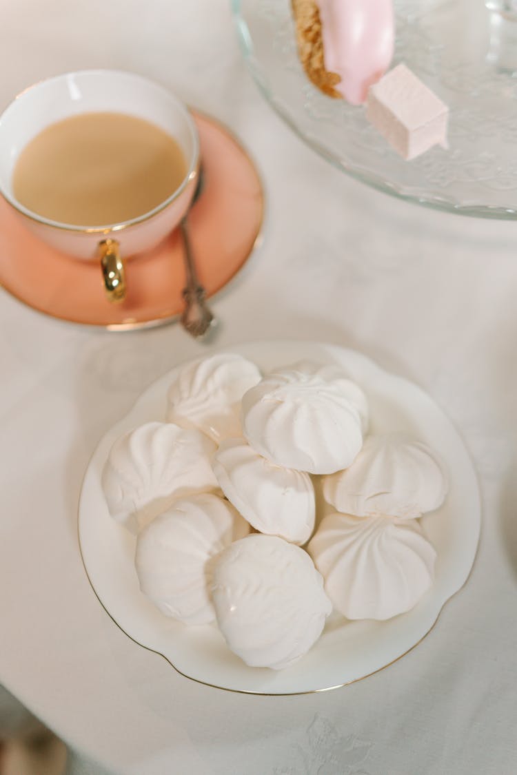 White Meringue On White Porcelain Plate 